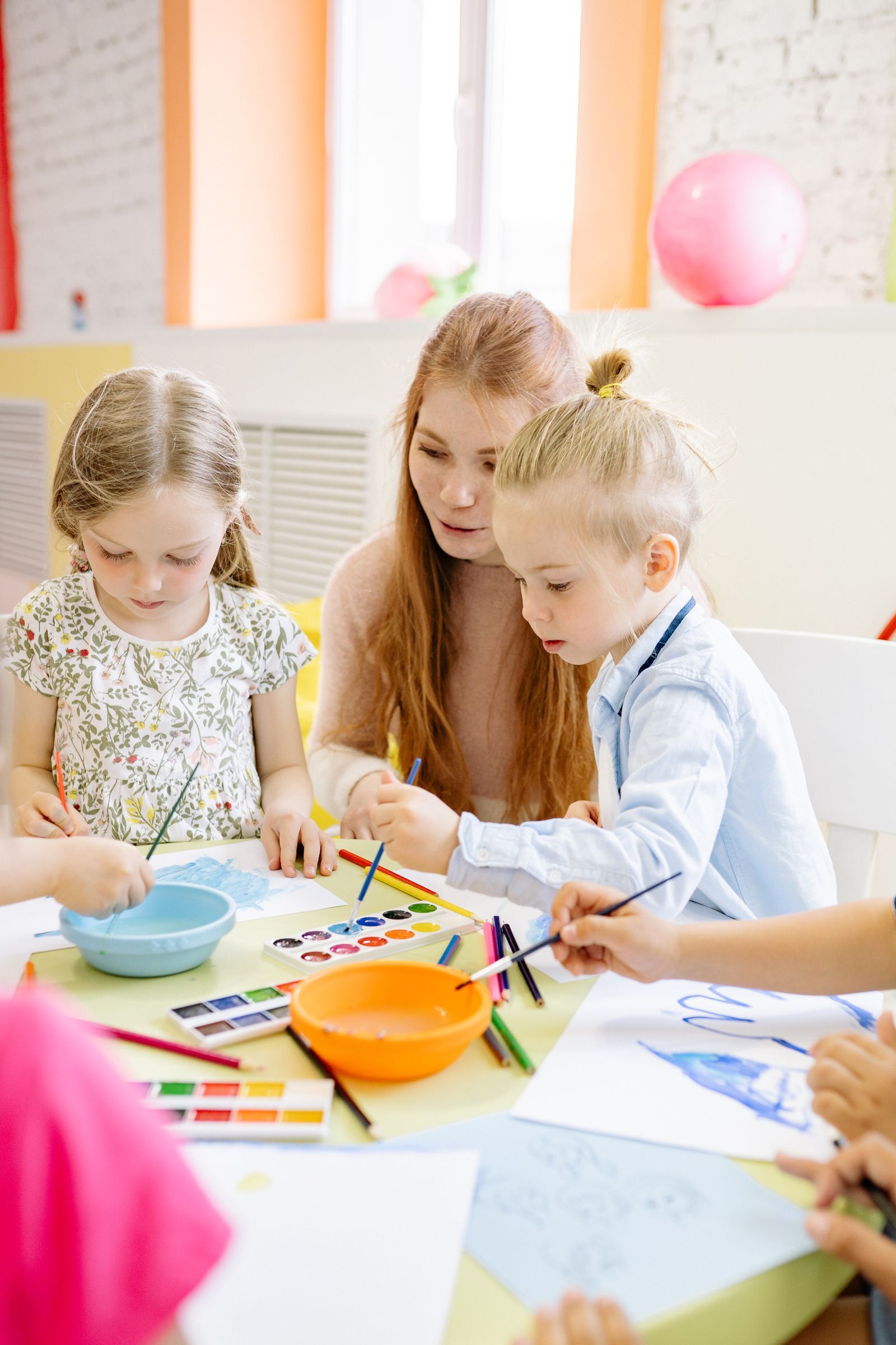 Stories, painting and learning to take turns.